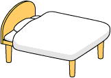 白いシーツを掛けたベッド